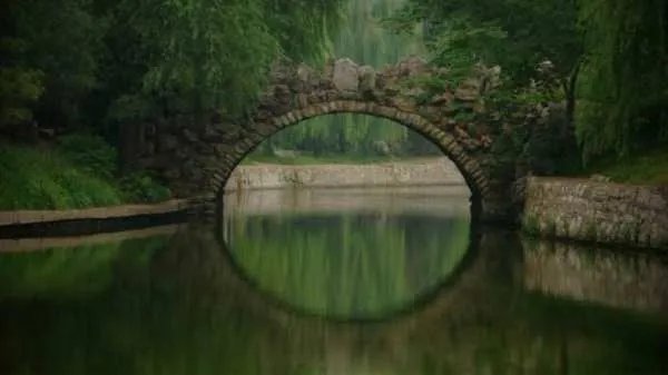 我愿化身石桥500年受风吹雨打,可以深切的说说什么意思?